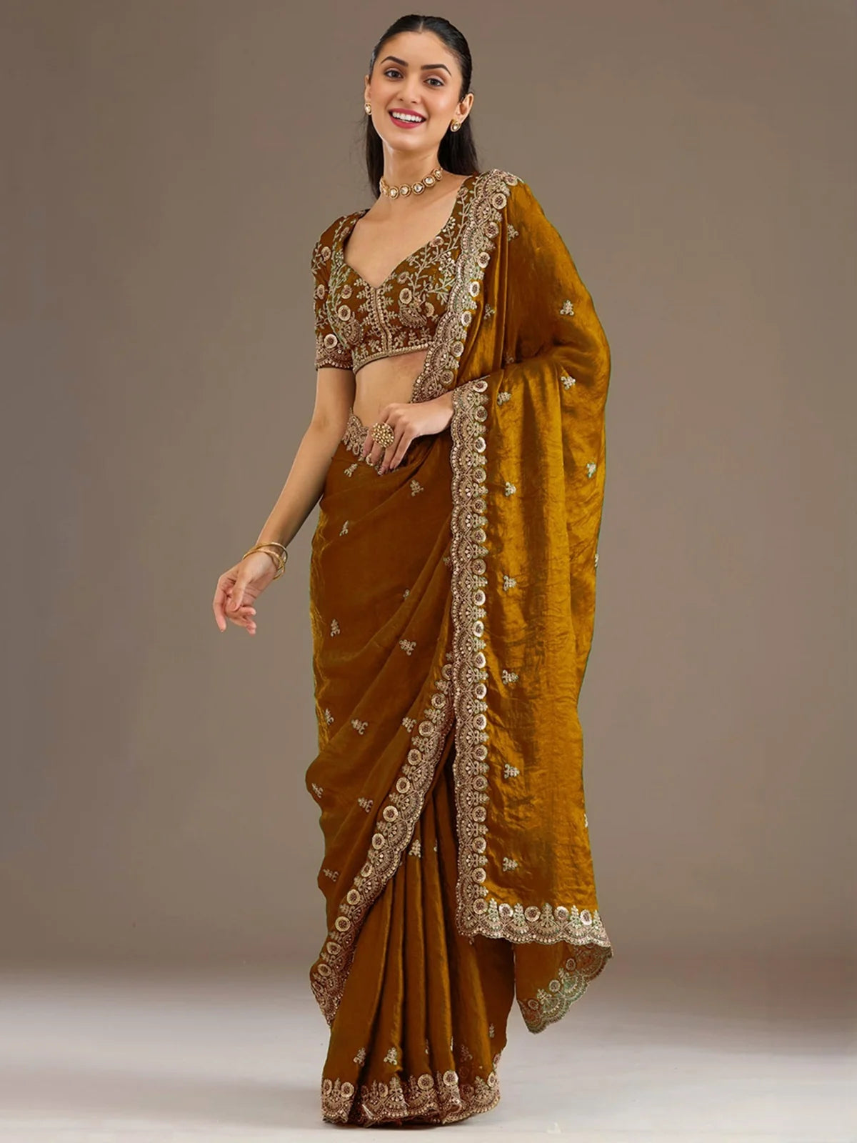 Tarani Rajeshri golden tissue saree front view designer wedding wear saree