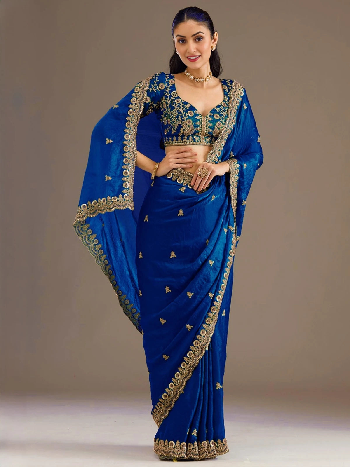 Tarani Sagarika royal blue tissue saree front pose with heavy zari dori sequins embroidered border