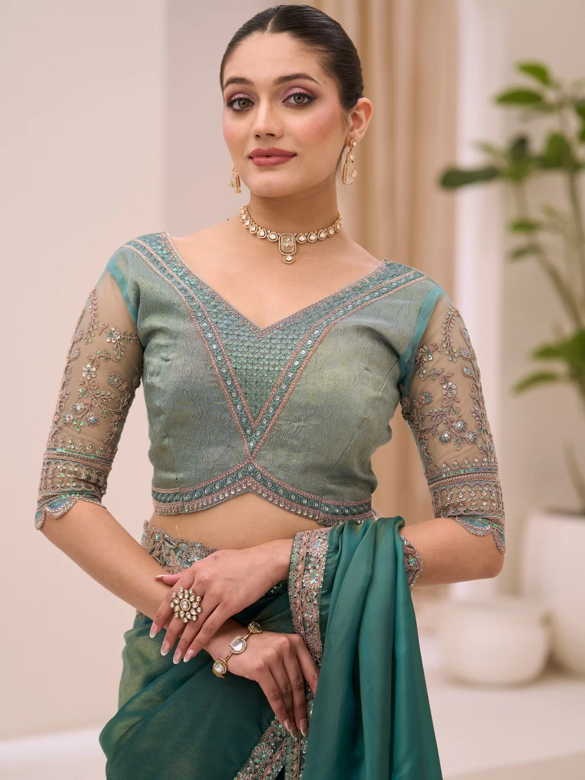 Tarani brocade zari work blouse close up with teal tissue saree Aashika