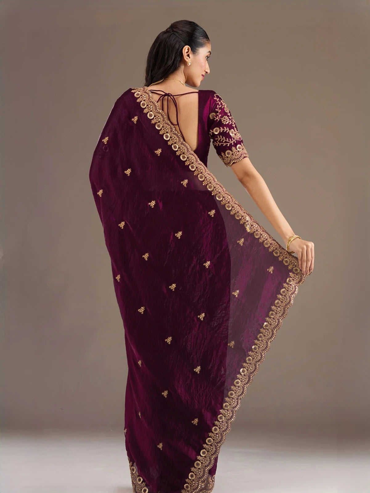 Tarani Avika wine tissue saree back view showcasing blouse back design and embroidered pallu