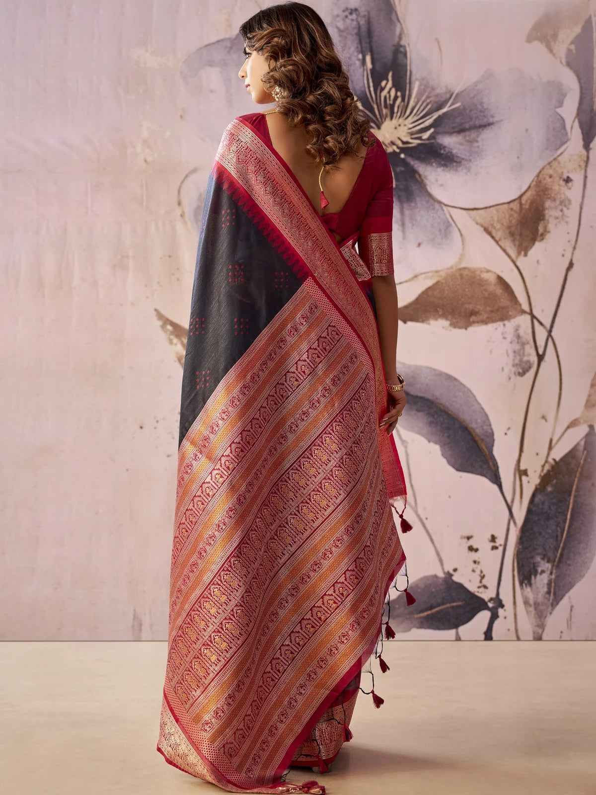Tarani black tissue silk saree back view with jacquard pallu