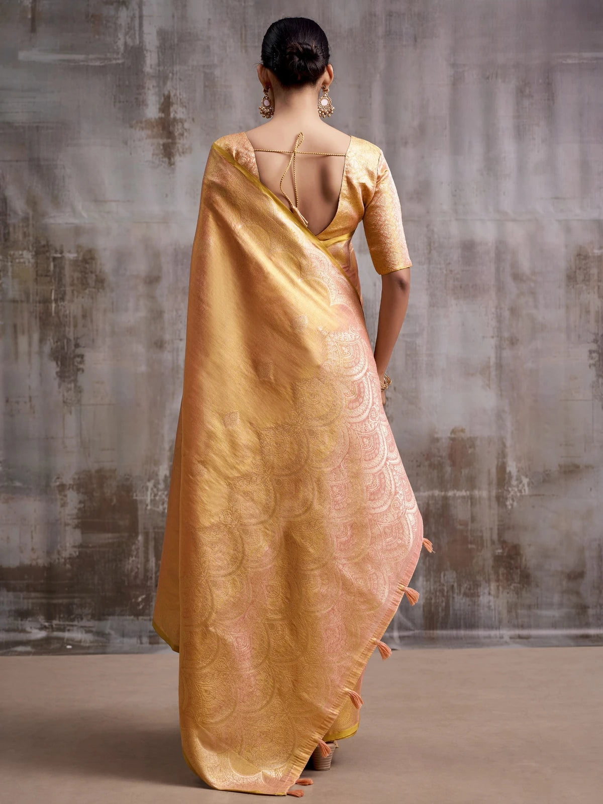 Tarani golden tissue silk saree back view with blouse design and pallu