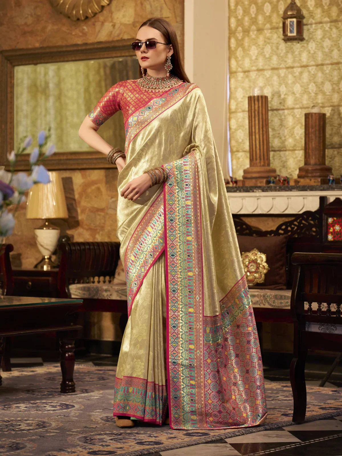 Tarani golden tissue silk saree full view with designer border and contrast blouse