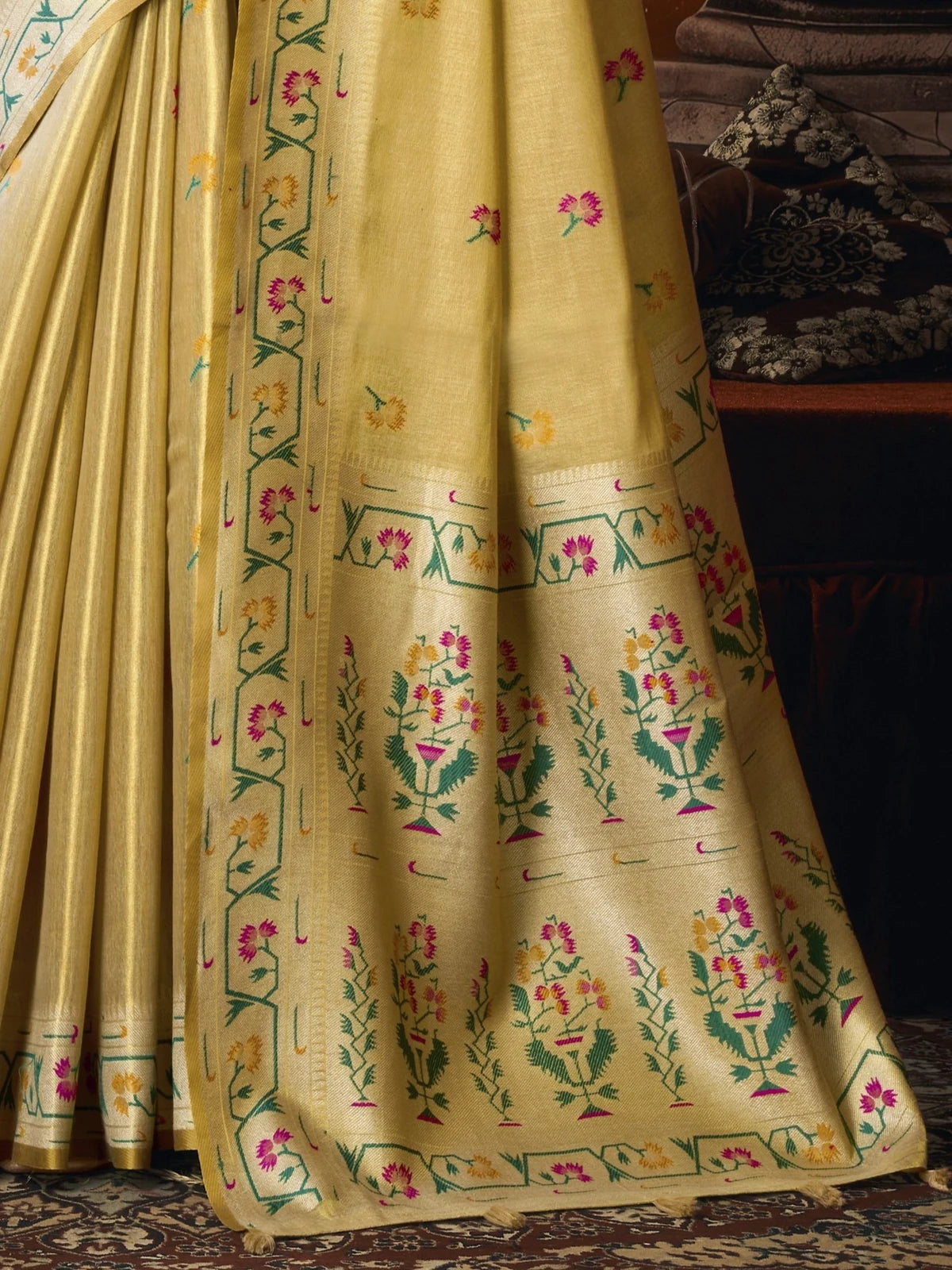 Tarani premium golden tissue silk saree pallu view with Paithani floral woven border and tassels