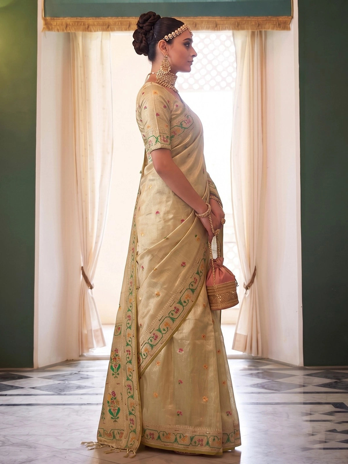 Tarani Swarali golden tissue silk saree side view with woven border and matching blouse