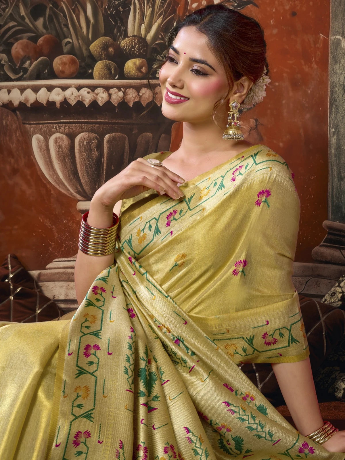 Tarani premium golden tissue silk saree upper body view showing elegant border and drape