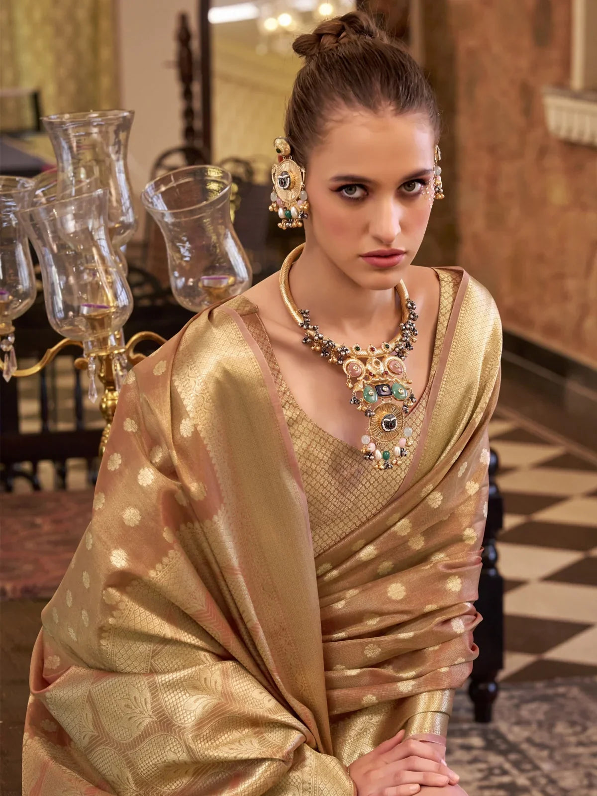 Tarani golden tissue silk saree upper body view showing zari motifs and matching tissue blouse with elegant styling
