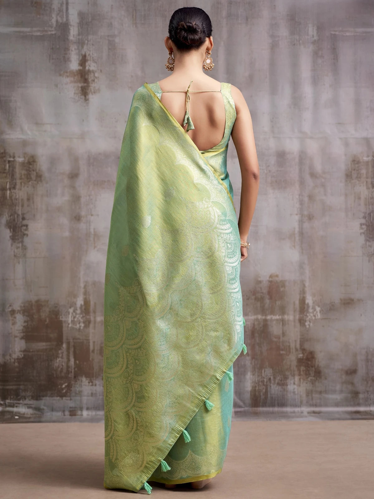 Tarani green tissue silk saree back view with blouse design