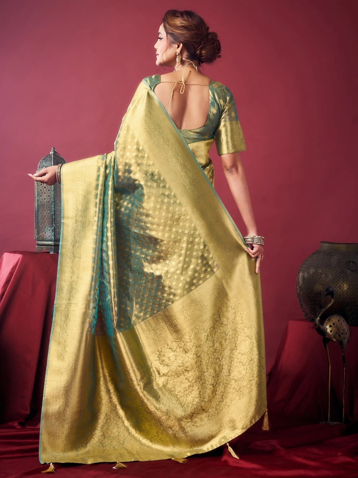 Tarani Dakshina green tissue silk saree back view showcasing pallu and blouse design