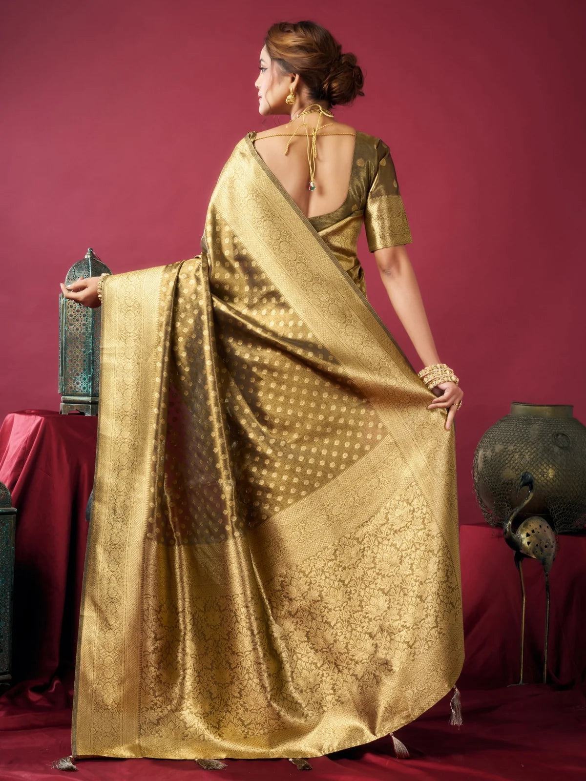 Tarani Snehal green Tissue Silk saree back view showcasing blouse back and grand pallu