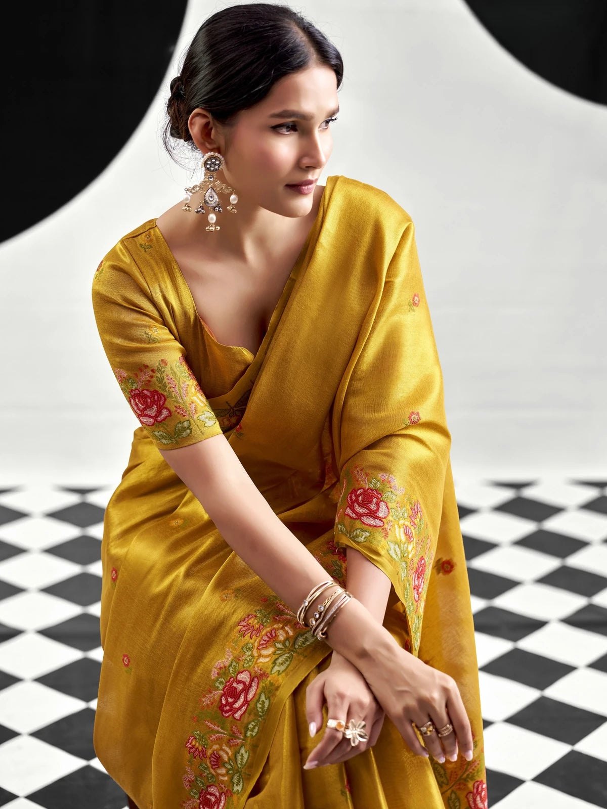 Tarani mustard tissue silk saree with floral woven border upper-body-view Priyansha