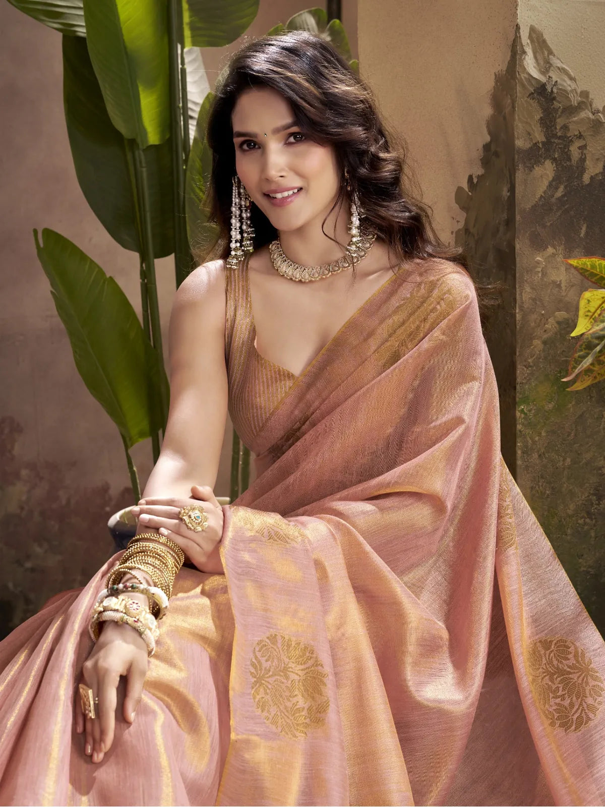 Tarani peach pink tissue silk saree with blouse upper body view