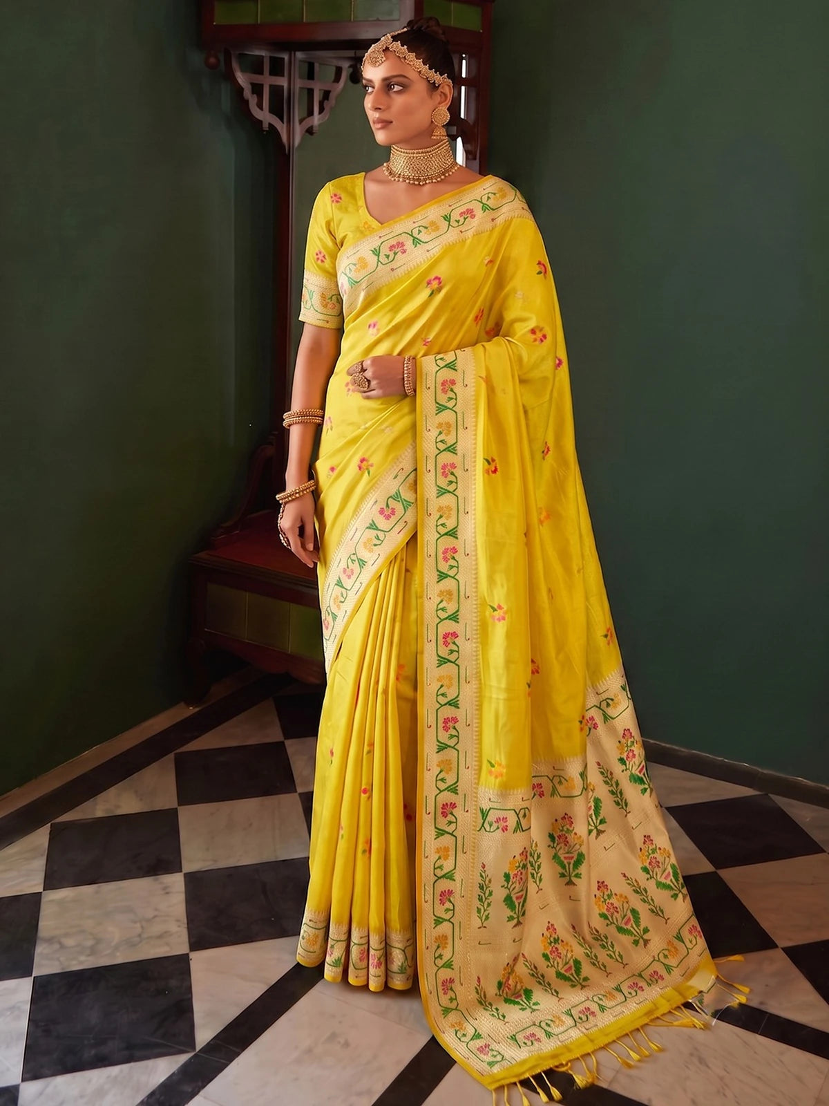 Tarani Pavitrika yellow tissue silk saree full view with floral woven border and designer pallu