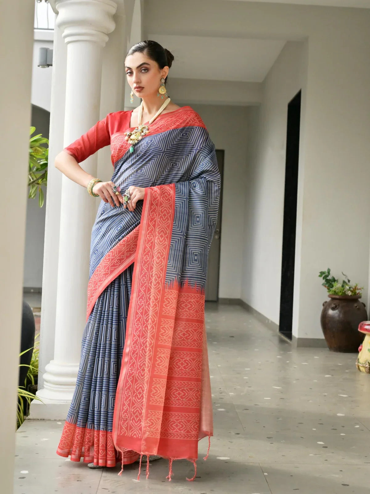 Tarani navy blue tussar silk saree with coral red border and blouse – full view