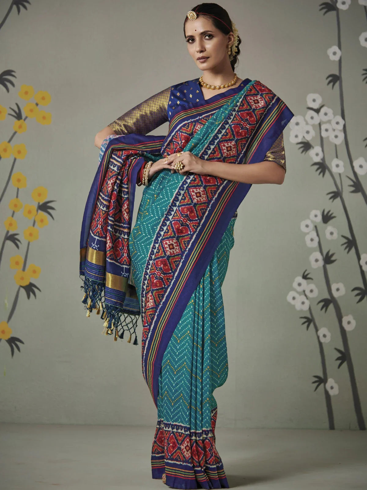 Tarani premium green Tusser silk saree with kalamkari print and patola pallu front full view