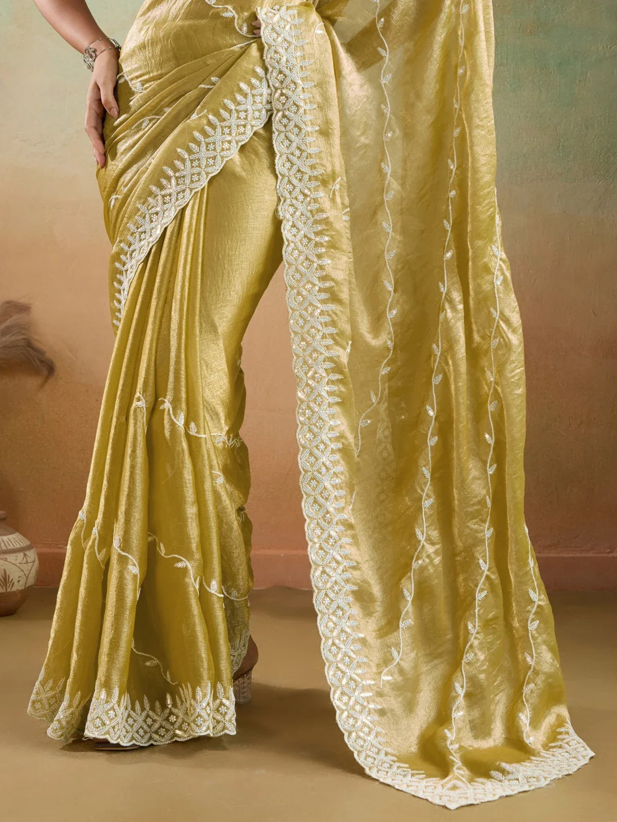 Tarani golden velvet chiffon saree pallu view with intricate border and elegant craftsmanship