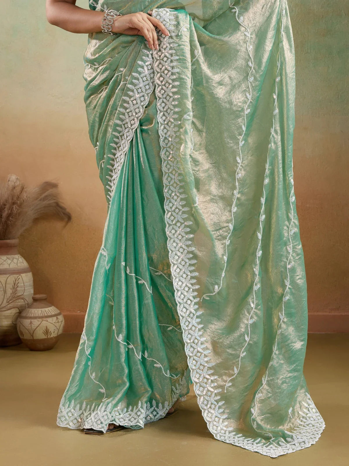 Tarani designer green velvet chiffon saree pallu and border view with tensile thread work