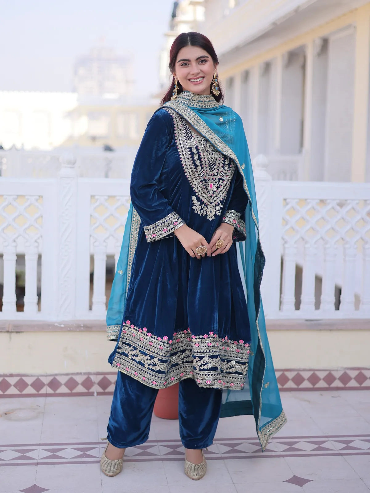 Tarani premium navy blue velvet party dress with embroidery and mirror neck design front view