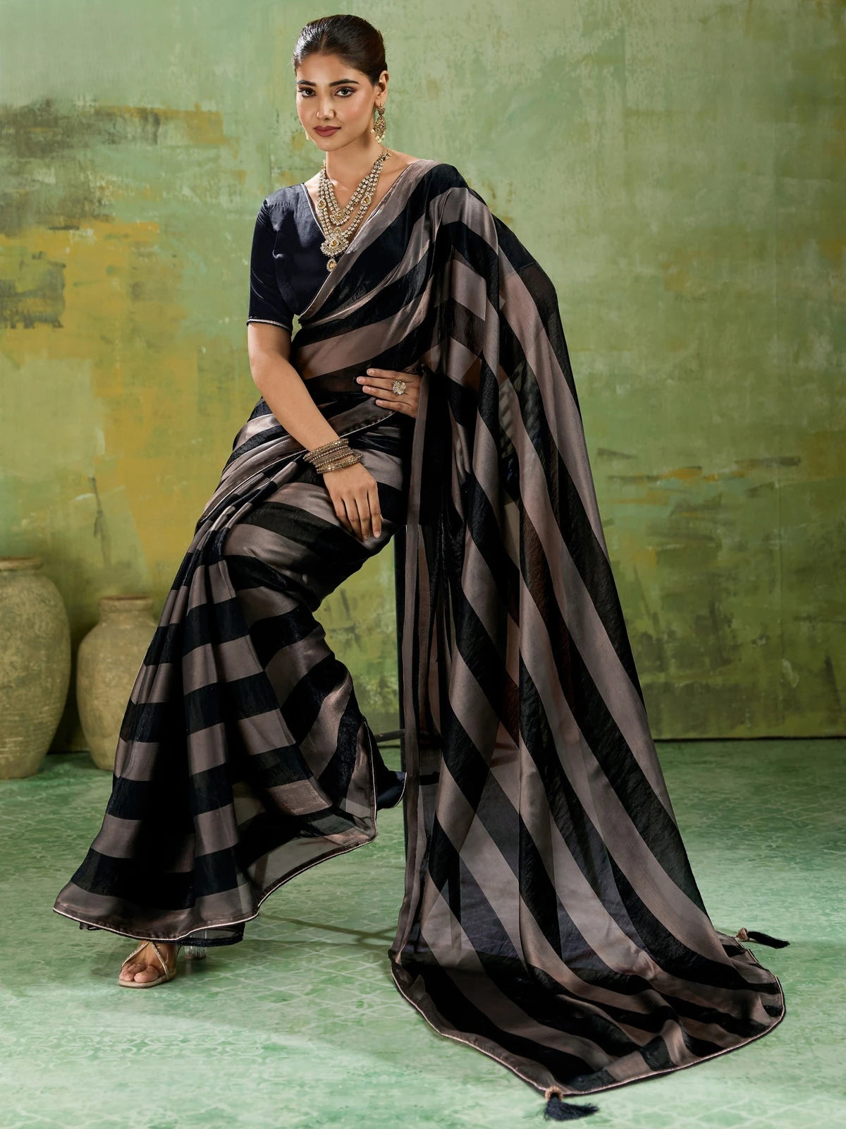 Tarani black velvet satin saree front view with elegant festive drape