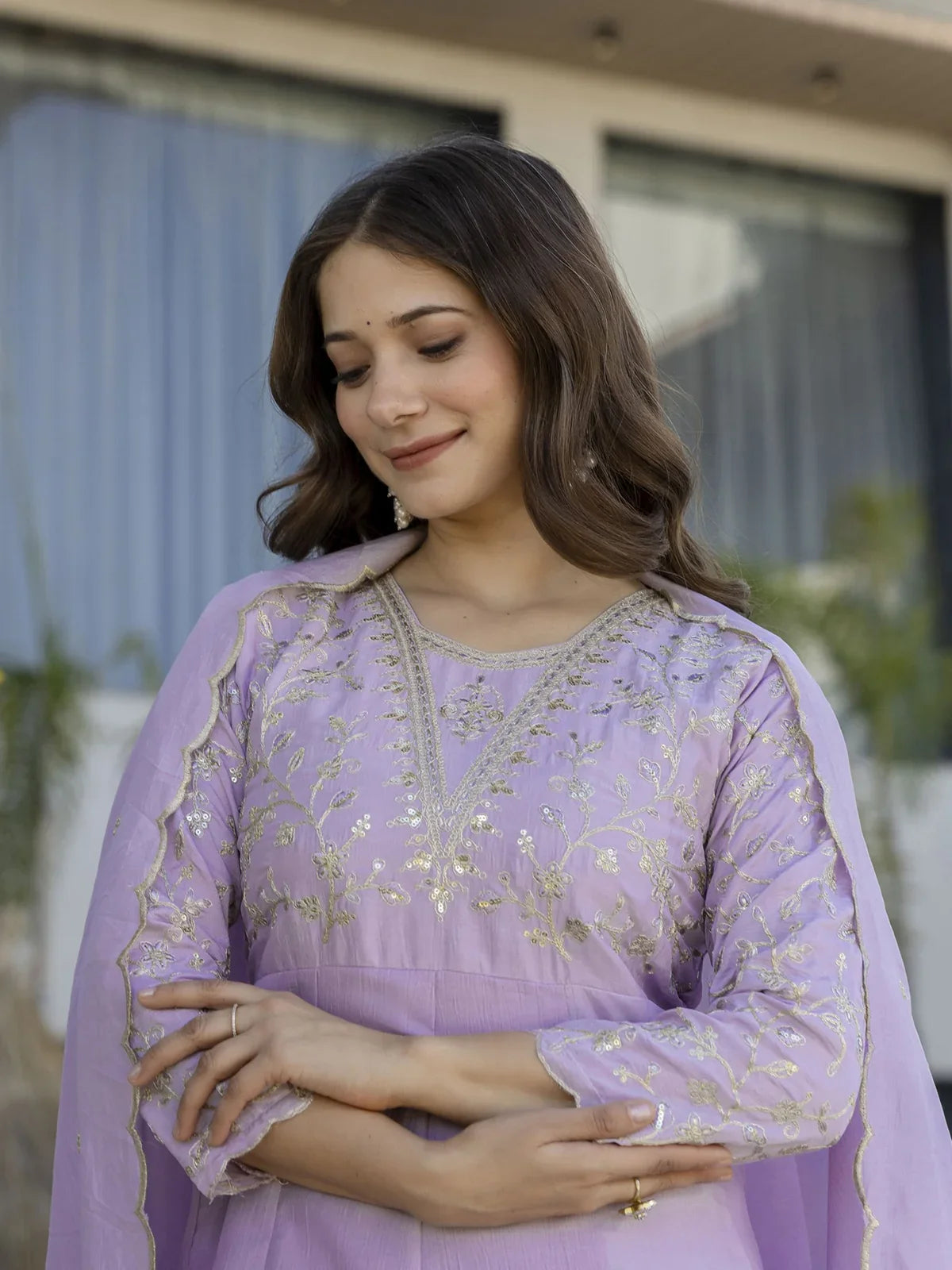 Tarani vichitra dress with elegant embroidery on sleeves and neckline close-up