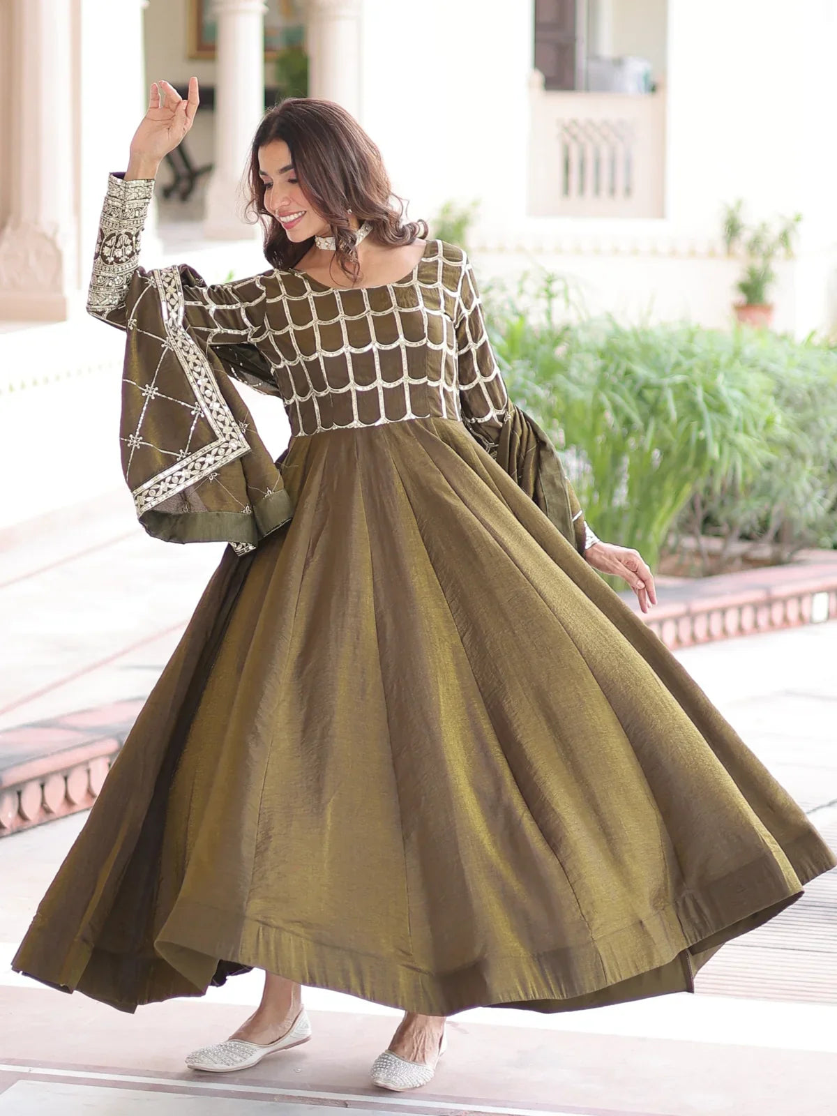 Tarani designer vichitra green gown full front view with elegant flare and dupatta