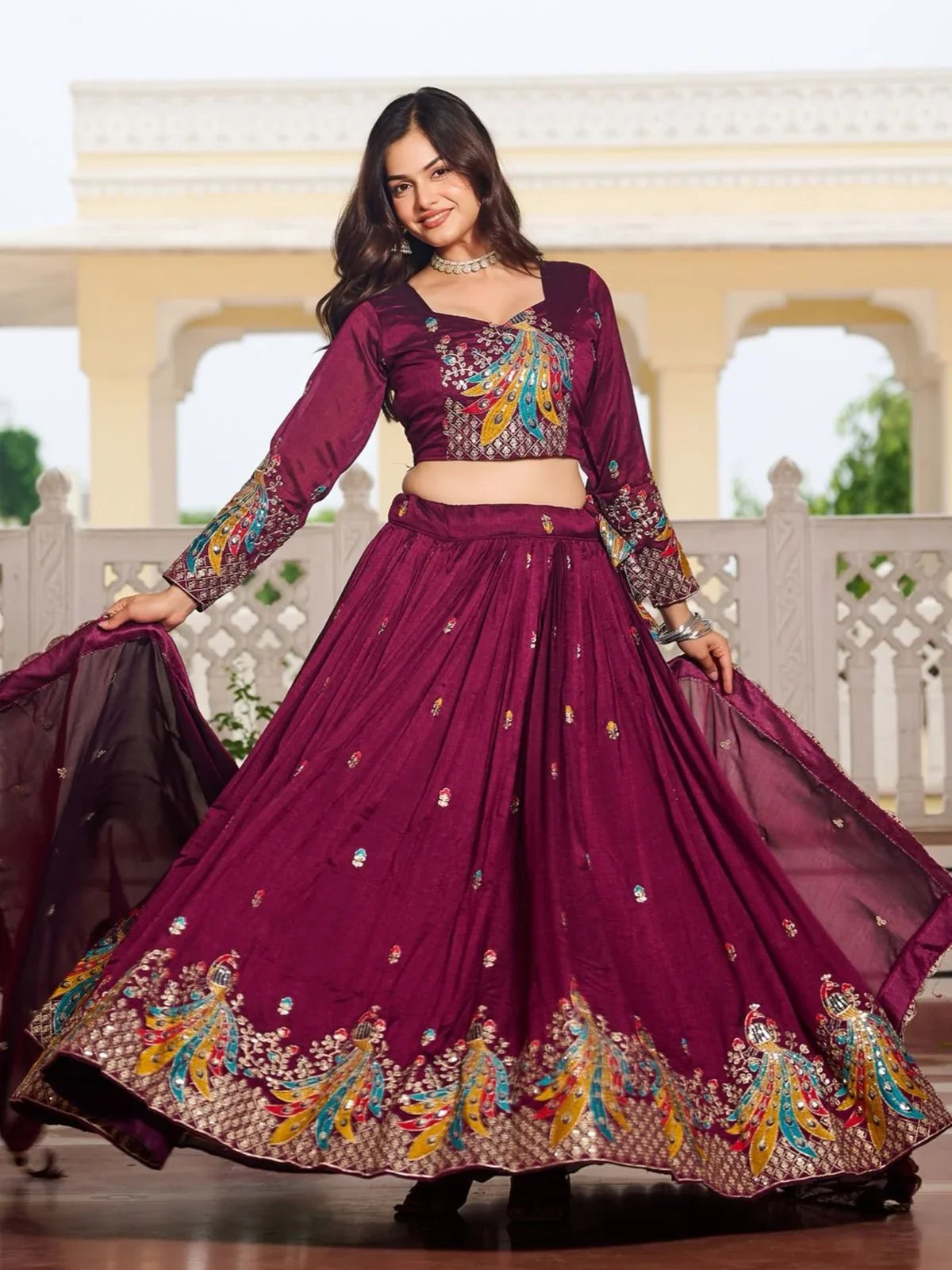 Tarani maroon lehenga front twirl showing full embroidery and elegant drape