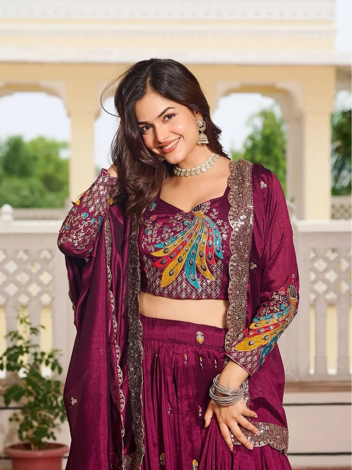 Tarani maroon lehenga blouse close-up with detailed thread and sequin embroidery