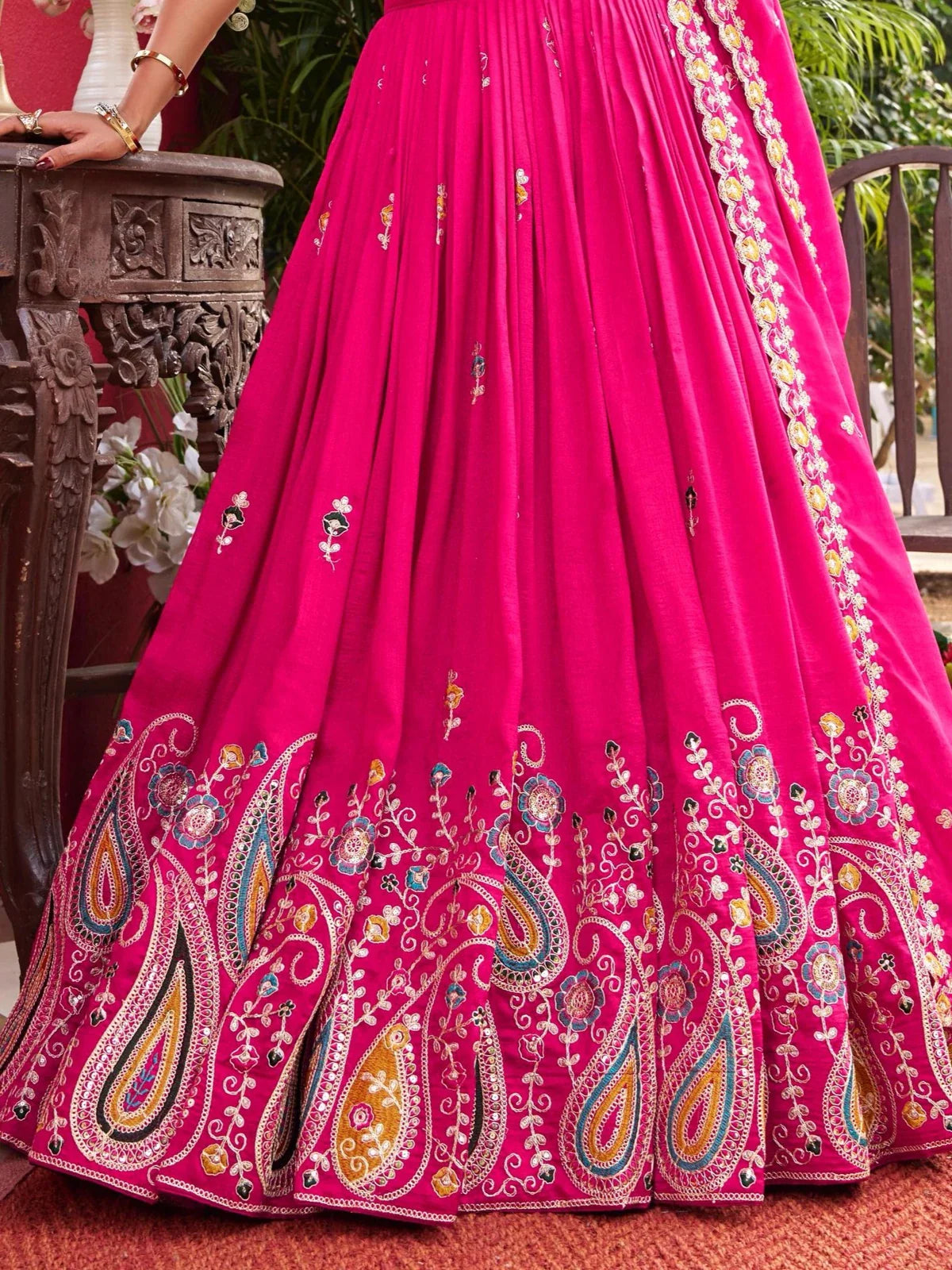 Tarani pink Vichitra lehenga closeup showcasing multicolor paisley and thread embroidery