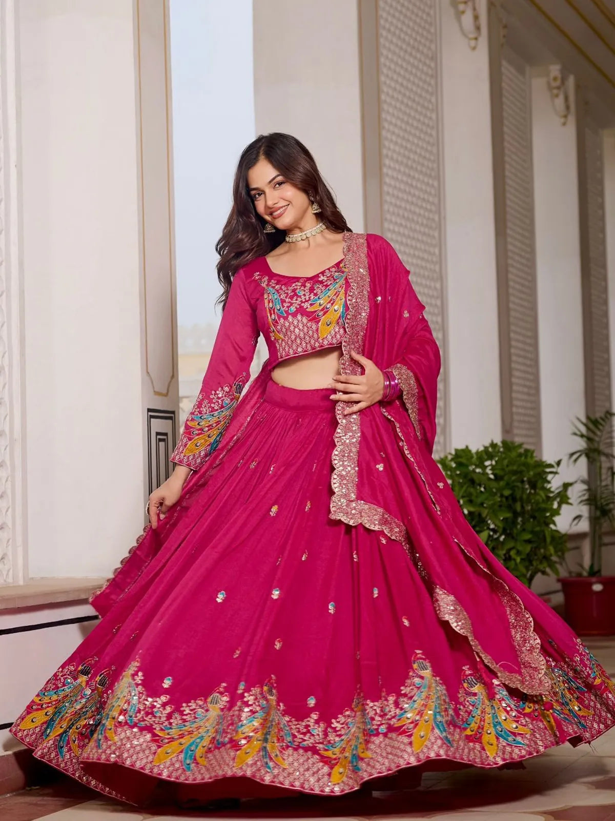 Tarani festive pink lehenga front view with heavy thread and sequin embroidery work