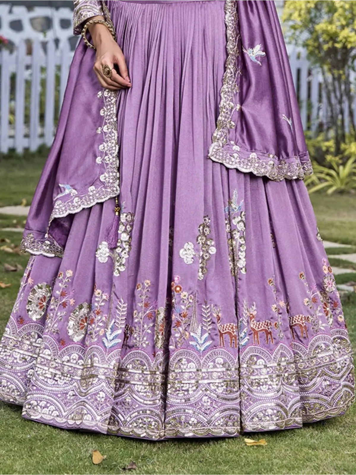 Tarani purple lehenga closeup with floral thread embroidery and sequin work on border