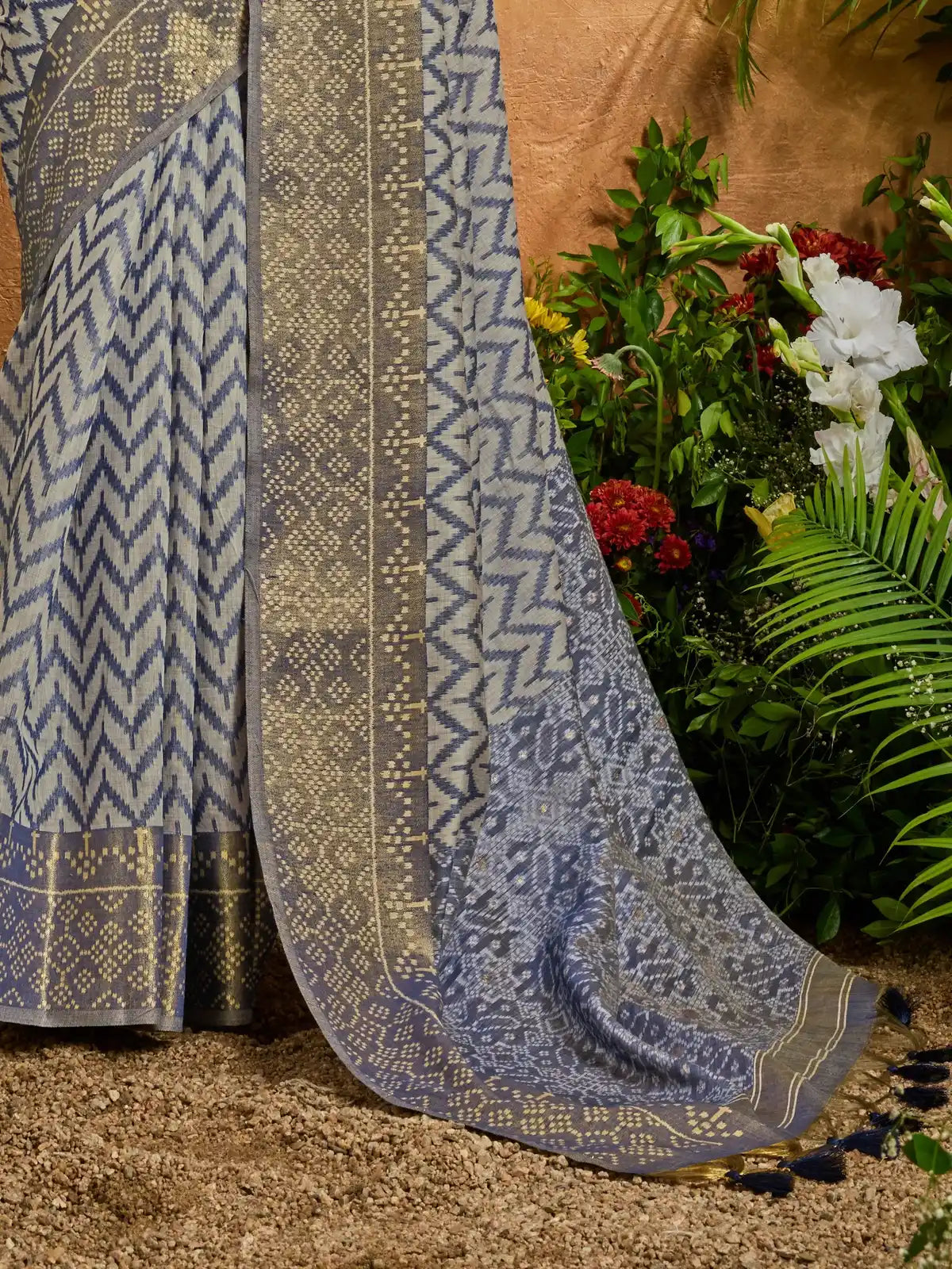 Tarani patola style saree in blue showing intricate pallu design and gold details