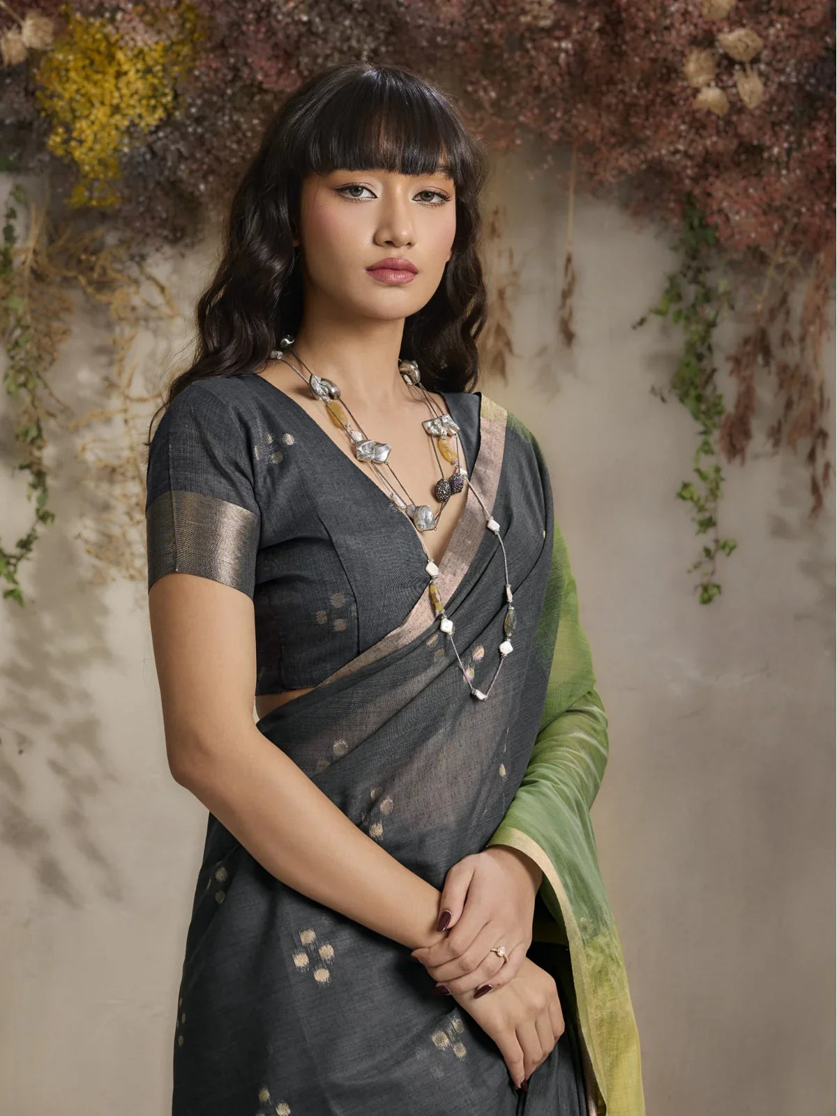 Tarani viscose cotton green saree upper body view with elegant blouse and soft gold work