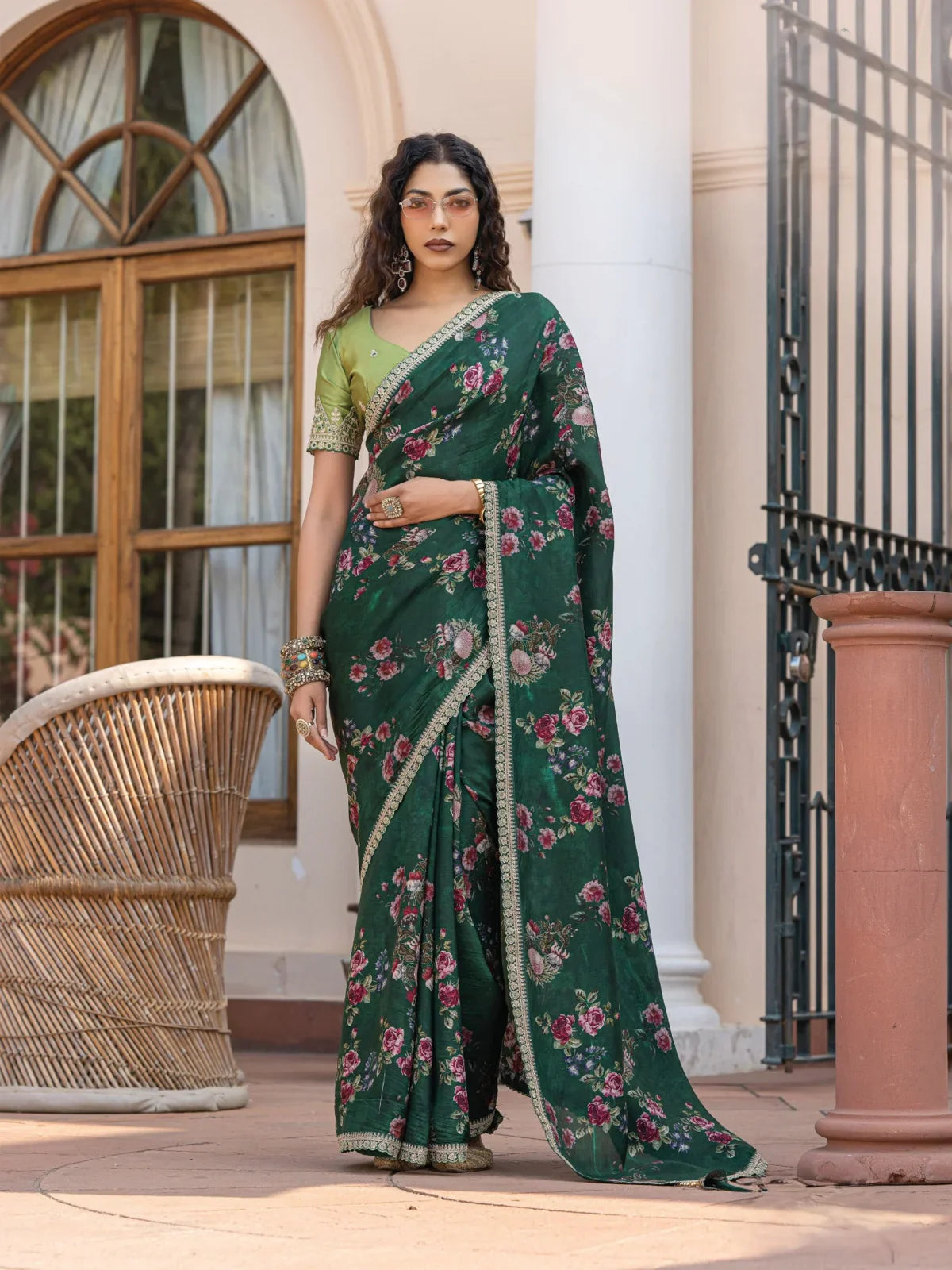 Tarani premium green viscose dola silk saree full view with floral design and blouse piece