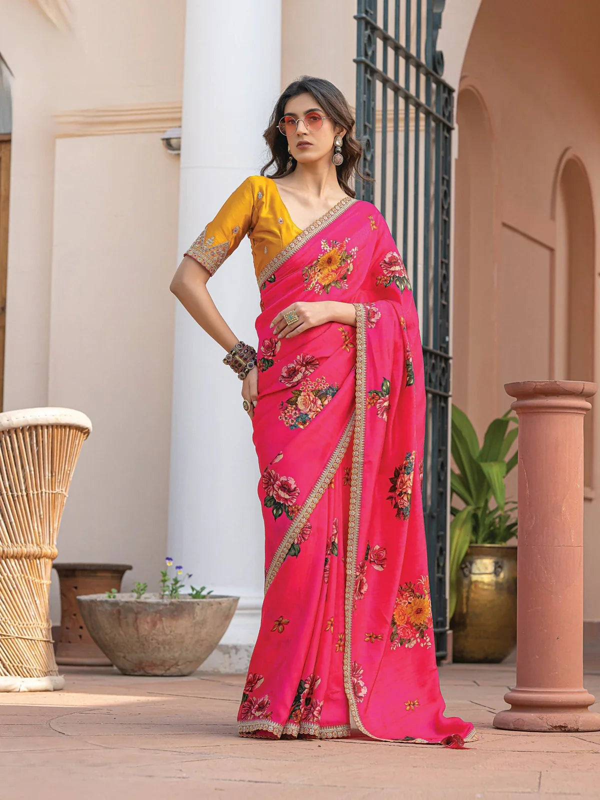 Tarani pink floral viscose dola silk saree full view with embroidered border and mustard blouse