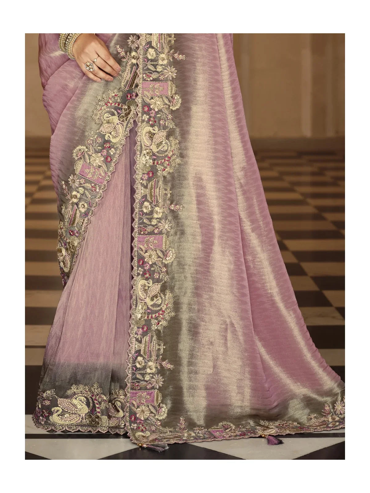 Tarani lavender viscose jacquard saree pallu view with fancy tassels and hand work embroidery