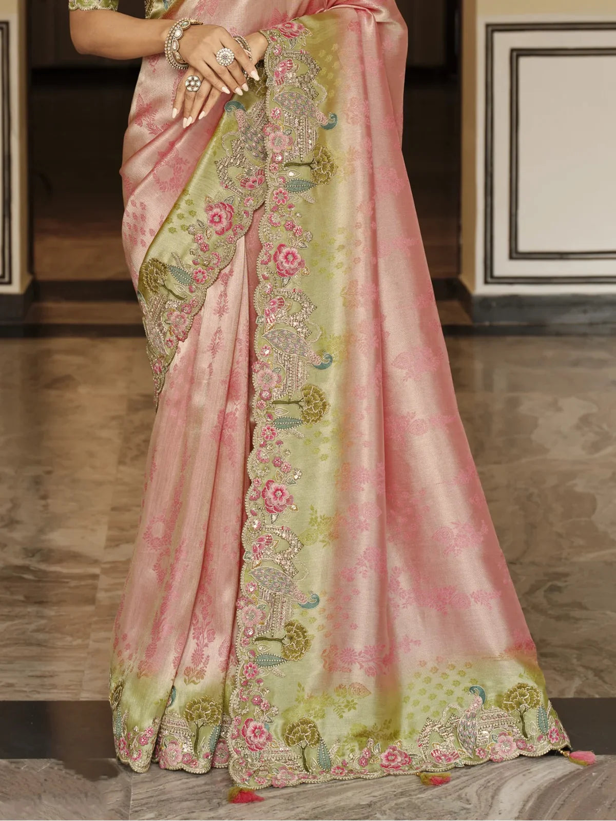 Tarani pink green viscose jacquard saree close pallu view with embroidery and tassles