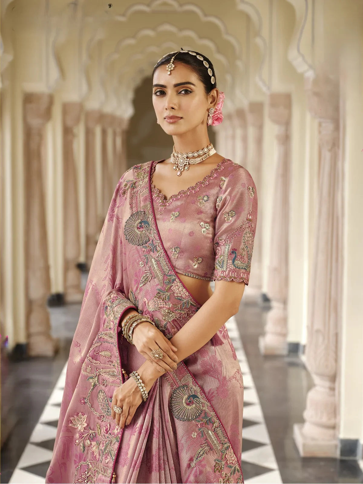 Tarani elegant pink viscose jacquard saree with silk blouse upper body closeup showcasing embroidery