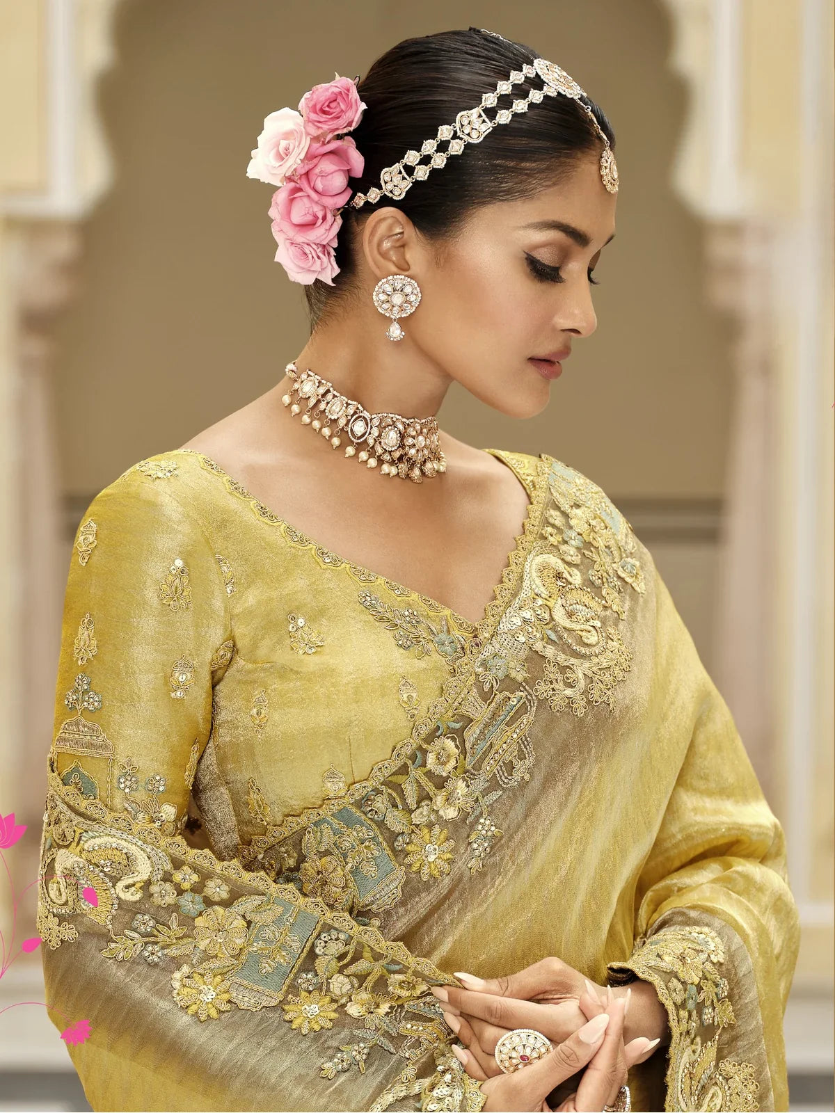 Tarani yellow viscose jacquard saree upper body view with embroidered border and silk blouse