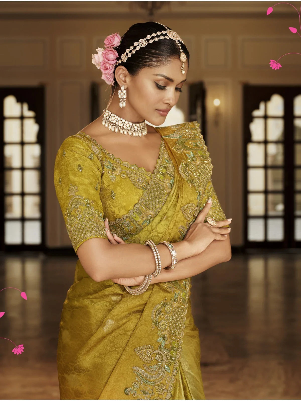 Tarani yellow viscose jacquard saree upper body view with embroidered blouse and tassels
