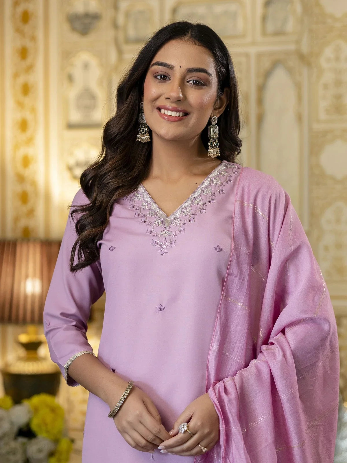 Tarani closeup of rayon dress embroidery with V neckline and soft pink tone