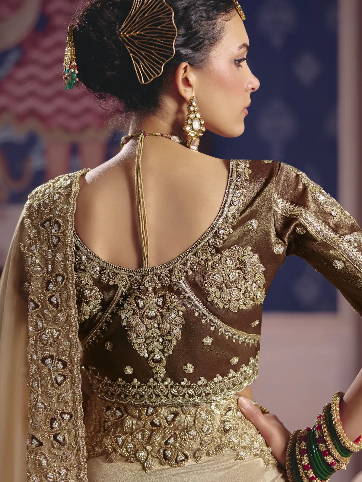 Tarani Pavitra back blouse view with heavy embroidery and embellished border saree by Tarani