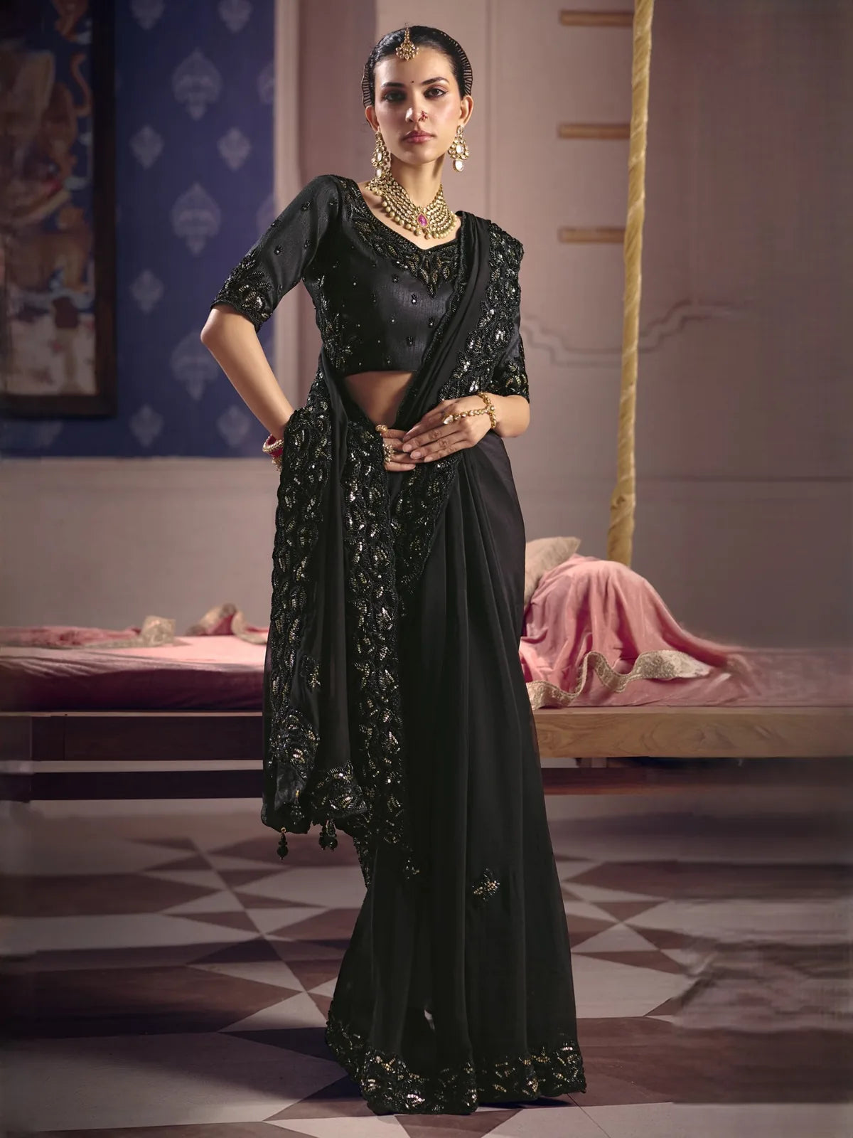Tarani black saree front view with embroidered border