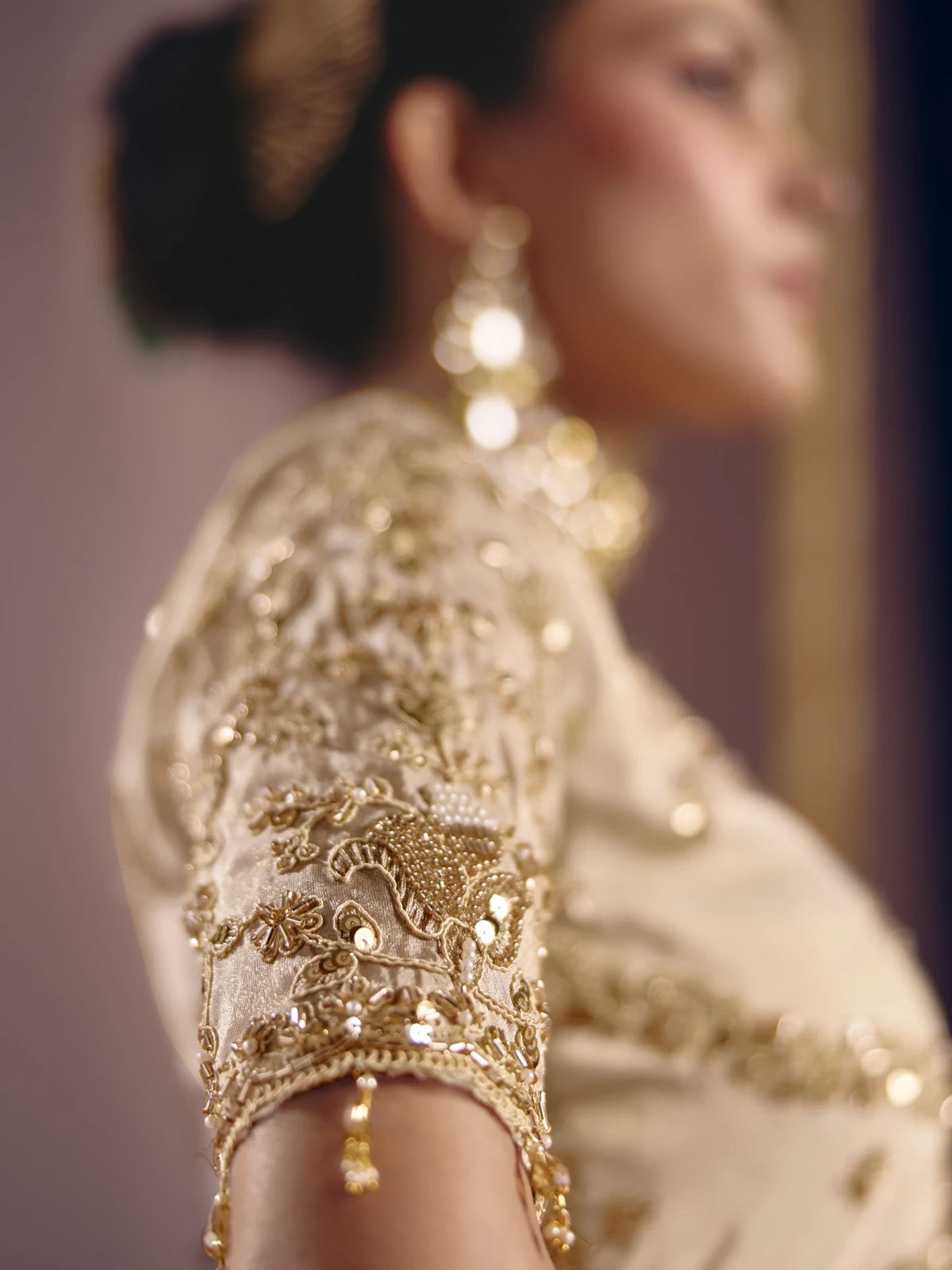 Tarani off white Viscose Zari Tissue Silk saree closeup blouse embroidery bead work and sleeve detailing