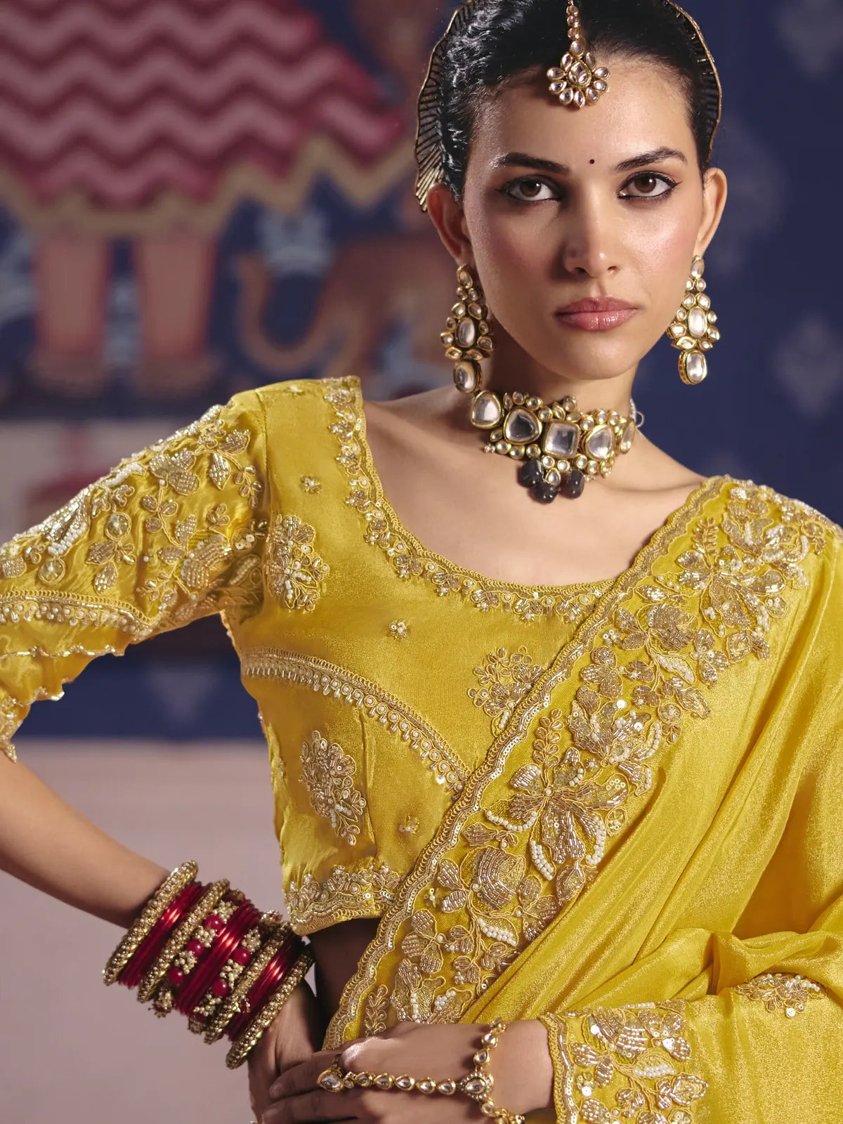 Tarani Deepali yellow saree upper body view with embroidered blouse heavy bead work and zari detailing