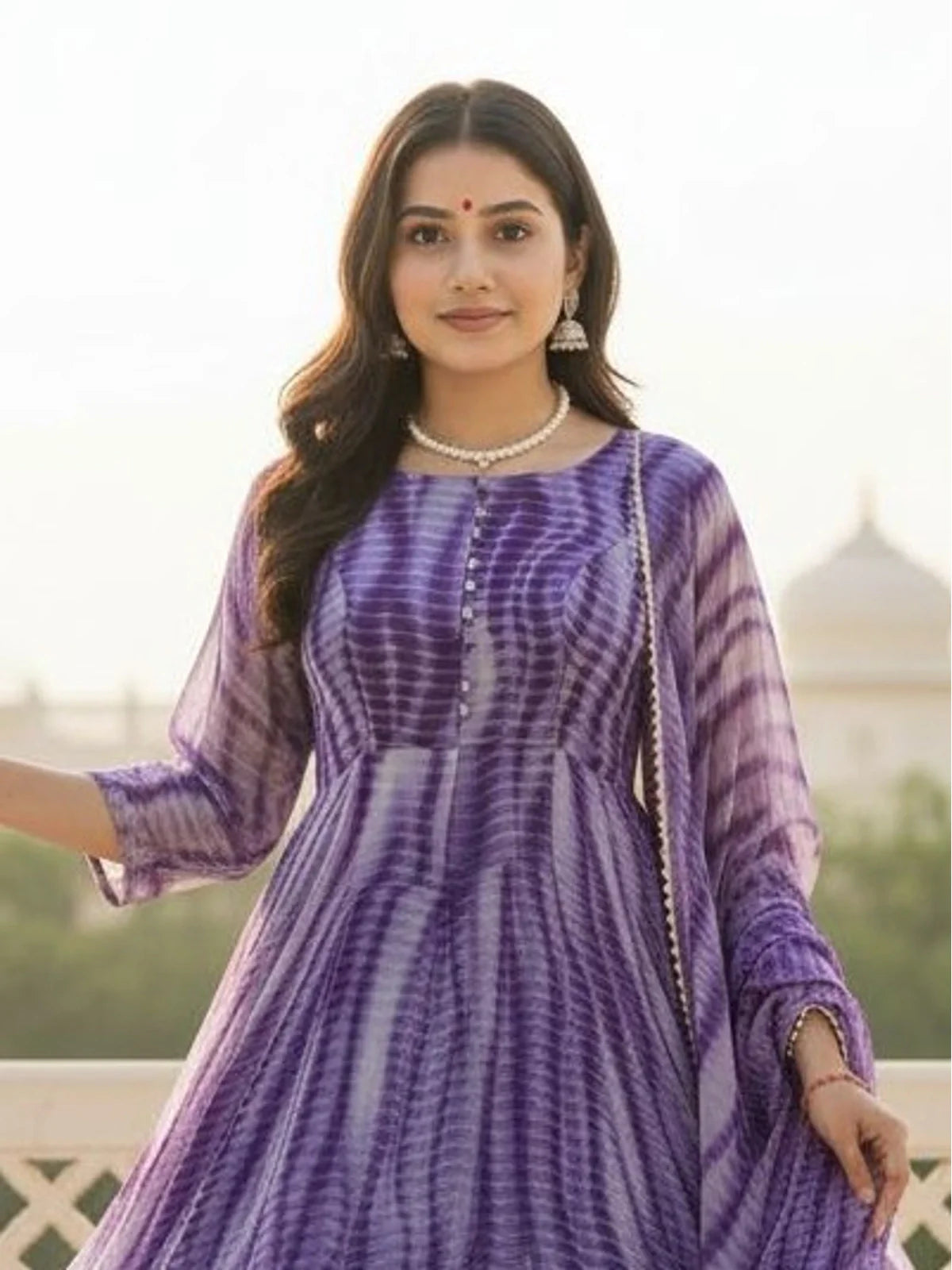 Tarani purple ethnic dress close-up with elegant potli print and soft dupatta