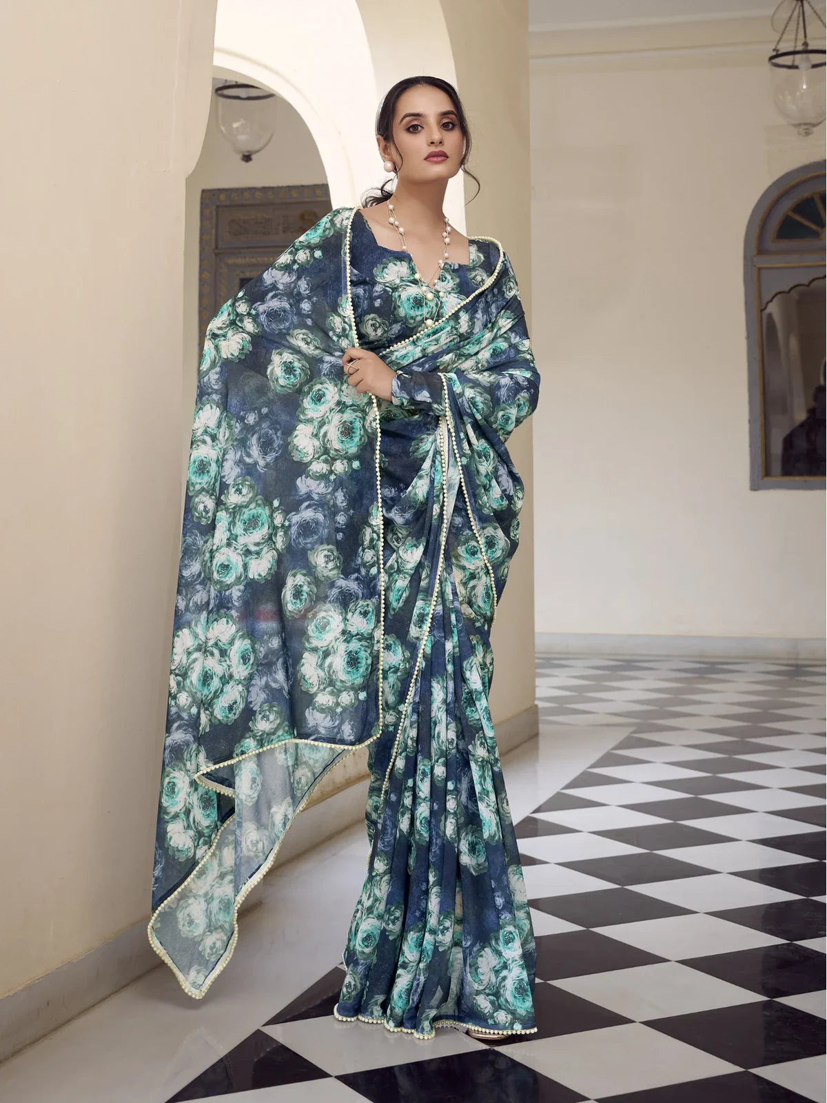 Tarani green floral printed weightless marbal saree with matching blouse and pearl lace border for casual or party wear