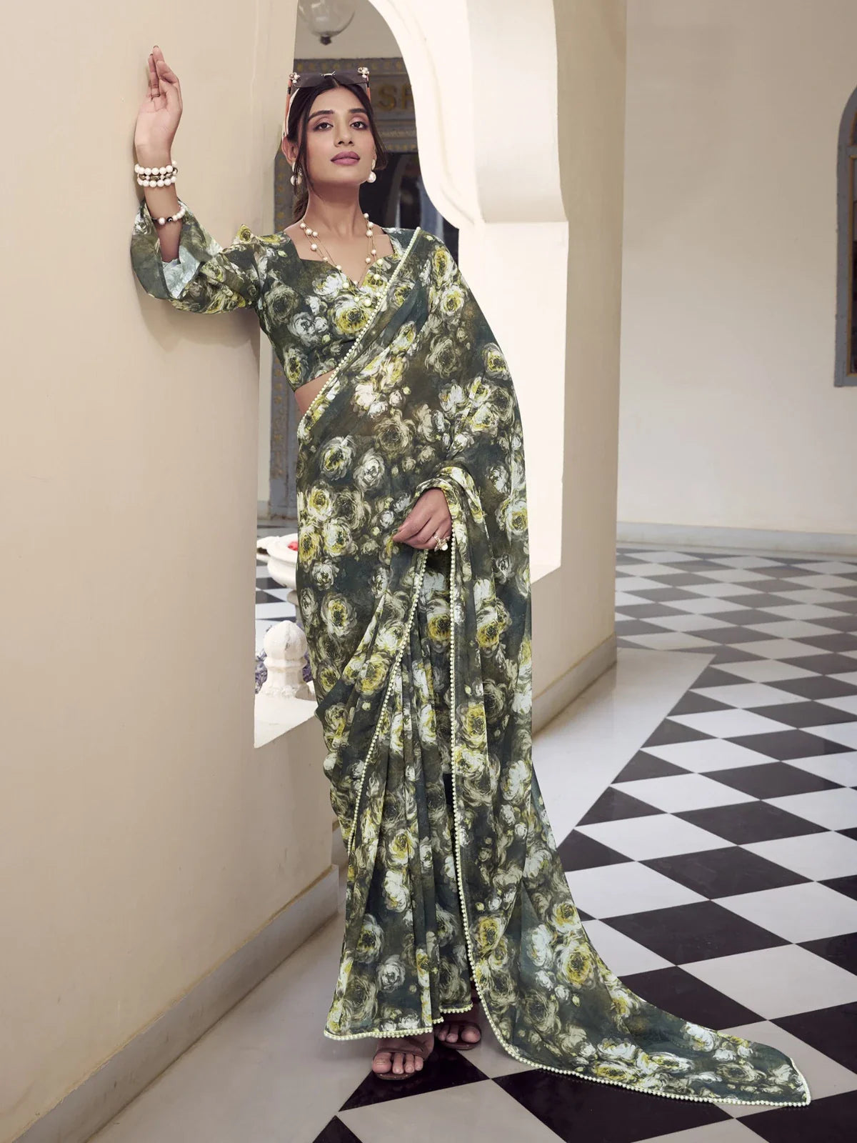 Tarani green weightless marbal saree with floral print and matching blouse in full view