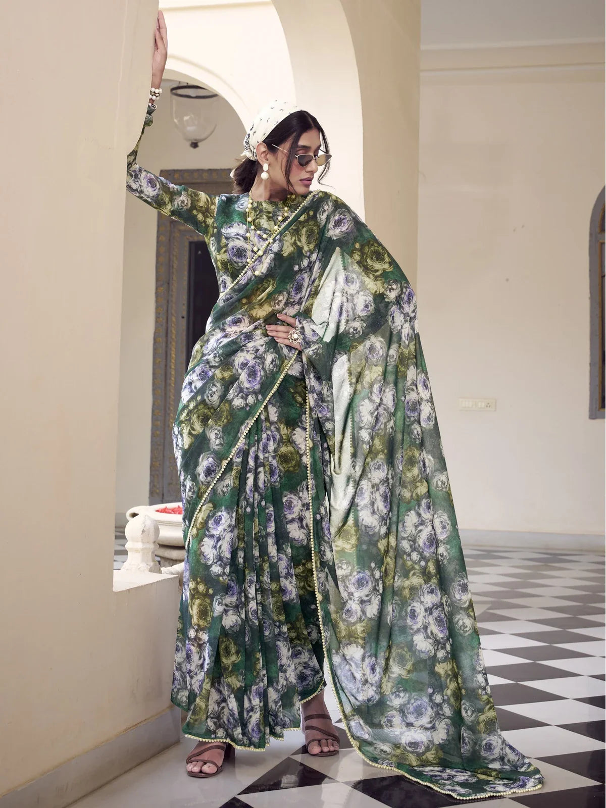 Tarani green weightless marbal saree full view with floral print and pearl border
